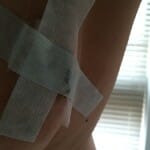 plastic baggie cut to size with sensitive skin tape on top...